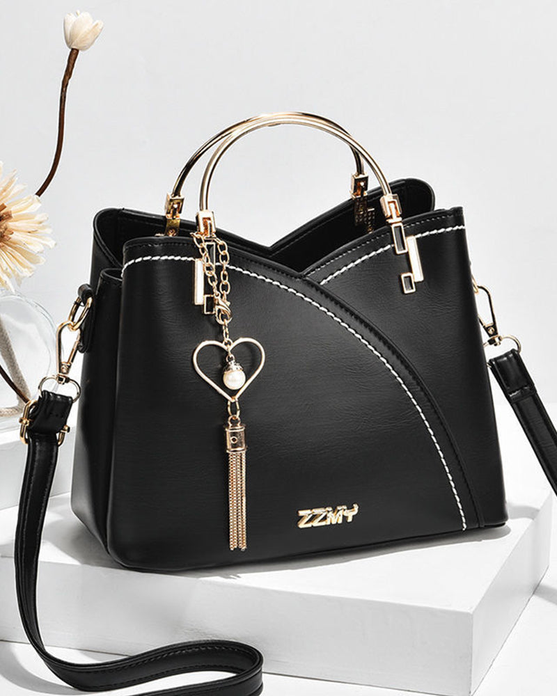 Handtas dames met schouderriem en hanger